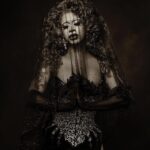 Miss Abby OMG Instagram – Praying for the world to be a better place!🖤 There’s so much going on at the moment in the world that makes me sad. Can we just all treat each other with respect and love? Is that too much to ask? Thank you and keep praying for the world!!! 🙏🏽🌎 
Pic: @renatadutreephotography 
Wig: @baehmbaehmwigs 
Corset: @shinedaddyshine 
#missabbyomg #praying #goddess #believe #dark #latina #abbyomg #drag #crosses #religion Fierce Church