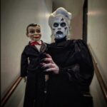 Morgan McMichaels Instagram - BEWARE THE STARE OF MARY SHAW ! One of my new Halloween characters this year was Mary Shaw from the @deadsilencemovie . Loved the character in the movie just wish she had more speaking parts lol ! Happy to add this to my Halloween arsenal !! Hair by @wigsbyhassoon Outfit by @tonyiniguezdesigns Doll by @worndoll Thank you to @artistrybyrenae & @chesphinx at @frendsbeauty for the quick masterclass in product choice and application,