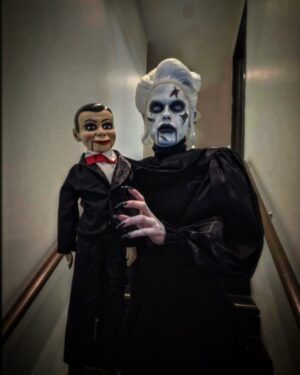Morgan McMichaels Instagram - BEWARE THE STARE OF MARY SHAW ! 

One of my new Halloween characters this year was Mary Shaw from the @deadsilencemovie . Loved the character in the movie just wish she had more speaking parts lol !  Happy to add this to my Halloween arsenal !! 

Hair by @wigsbyhassoon 
Outfit by @tonyiniguezdesigns 
Doll by @worndoll 
Thank you to @artistrybyrenae & @chesphinx at @frendsbeauty for the quick masterclass in product choice and application,