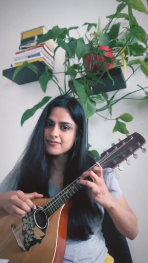 Neha Mahajan Instagram - I’m stringing my way through life 🎶🌧️