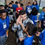 Nick Barrotta Instagram - spent my morning hanging with these awesome kids! 💙 thank you to the american giving project/ toys of hope team for having me back this year — and thank you for all you do for these children and families! today was a great reminder of what the holiday season is all about 🙏🏼💫 #toysofhope Oheka Castle
