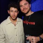 Nick Jonas Instagram - Hey UK friends… Drop a 🔥if you want @cianducrot’s “Red Dress” shirt. We’re trying to see something 👀