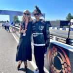 Nicki Shields Instagram – Portland you beauty! 🇺🇸 Soaking up an awesome atmosphere with Jaden Smith @c.syresmith on the gird. 

@piquetjr and @oliveraskew my wing men for the weekend 🎤🎤

Special shout out to everyone who looked after me this weekend… Bump and I felt very loved! It’s all those little things that really add up. Especially to Scotty dog @broncosound… Who carried around a foldable chair for me while we were on air just in case I needed to sit down.. 😳🥰🙌🏼 What a total legend! 💖

Thanks for all the lovely messages of support too, it really means a lot. 😘

There’s been a lot of love this weekend for these boots too.. I’m equally obsessed! Very kindly gifted from @russellandbromley. 👢👢Thank you @lauraparkesstyling_ 💖 

Black dress @thefoldlondon 
Sunglasses 🕶️ @olivergoldsmithsunglasses 

#formulae #jaydensmith #portlandeprix #7monthspregnant #thefoldlondon #olivergoldsmith #sunglasses #lbd #cowboyboots #russellandbromley #pitlane #sustainablefashion