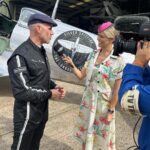 Nicki Shields Instagram - Stepping in back in time! Vintage fashion, iconic cars and flat out historic racing … Goodwood Revival has it all🙌🏼 Delighted to be back on the mic alongside @mr_davidgreen. 🎤🎤 Catch all the action live all weekend on the @goodwoodrrc and @skysportsf1 YouTube channel, and on @itv4 tonight. Thank you to my talented 📸📸 buddies @loujohnsonphoto and @dominic_james_photography And to @grantansbro79 for all the BTS 📸 Wearing @rocknromancevintage Glasses by @retropeepers Styled by @aliceburnfield Make up by @juliasnowdon.mua #goodwoodrevival #historic #racing #vintage #vintagefashion #f1 #itvsport #skysports Goodwood Motor Circuit