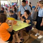 Nicole Seah Instagram - It always feels like home in Fengshan hawker centre, where @fooseckguan.sg, myself and the team had our market visits this morning. It’s my third time here in 2 weeks, as we visited in the evening after our weekday house visits and after food distribution. A volunteer remarked that it almost feels like a Kampong because the residents and stallholders we meet are always warm and welcoming, and ready to engage in a deep conversation about their lives and the issues that matter to them. One interesting convo that popped up by a lecturer having her breakfast, touched on how we can continue to foster interest amongst the youth to patronise hawker centres as a social gathering point, and to appreciate the hawker trade. It is hard work being a hawker, with many of the stalls opening at 4-5am just to prep and make sure they are ready for the day. We are also appreciative for the wealth of affordable culinary options available to us, even as hawkers grapple with the rising costs of raw materials. Fengshan Hawker Centre