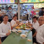 Nicole Seah Instagram - The WP East Coast team including @fooseckguan.sg and myself conducted our Christmas walkabout across the various markets this weekend, delivering 1000 Christmas cookies to the residents of East Coast GRC. This year, we supported a home baker Yummy Story (@yummytory2022 on Instagram) who customised cookies in the shape of a Christmas tree with icing to mimic trimmings and decorations. It was encouraging to feel the warmth and appreciation from residents, many of whom we are now meeting on a repeated basis as the various markets have become familiar ground over the years of outreach. Personally as I reflect on 2022 and the major life changes I’m going through with baby N and juggling raising two young kids alongside professional and political demands, Christmas this year feels a tad quieter and with much less fanfare. It’s also given me pause to appreciate the people in my life who have been a source of strength and support along the way, as well as those whom our paths have crossed or converged. And perhaps that is the spirit of Christmas, for us to take stock of life as it were and our impact on the people in our lives. When we think about the season of gifting, perhaps it is less about chasing the harried purchasing of physical gifts that we bear, and more of the immaterial such as time, thoughtfulness and kindness that leave an indelible trace in hearts and minds. Such gifts are much harder to procure, and require more effort to consistently deliver. I wish everyone happiness and contentment for the coming year, and the now ubiquitous wish that may you also enjoy good physical and mental health always.