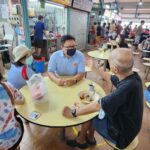 Nicole Seah Instagram - The Kampong spirit was truly alive and well at Fengshan 85 today. Aunty brought down a huge pot of peach gum dessert for the neighbours to share after having their breakfast in the hawker centre - A mouthwatering assortment of options like vegetarian bee hoon, carrot cake, porridge, mee pok, you tiao… The list goes on. Fengshan residents are blessed to live near this culinary heaven! She had thoughtfully packed disposable bowls and offered me a portion. It lifted the spirit and was refreshing on the palate. Lots of young families this morning, as @fooseckguan.sg and the team engaged with residents. Longtime EC volunteer James had a field day practising to be a grandpa! Another team was mobilised at 58 market today to also engage with the residents. It was good to see everyone, and we will be back again soon. Fengshan Hawker Centre