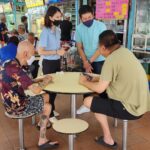 Nicole Seah Instagram - The Kampong spirit was truly alive and well at Fengshan 85 today. Aunty brought down a huge pot of peach gum dessert for the neighbours to share after having their breakfast in the hawker centre - A mouthwatering assortment of options like vegetarian bee hoon, carrot cake, porridge, mee pok, you tiao… The list goes on. Fengshan residents are blessed to live near this culinary heaven! She had thoughtfully packed disposable bowls and offered me a portion. It lifted the spirit and was refreshing on the palate. Lots of young families this morning, as @fooseckguan.sg and the team engaged with residents. Longtime EC volunteer James had a field day practising to be a grandpa! Another team was mobilised at 58 market today to also engage with the residents. It was good to see everyone, and we will be back again soon. Fengshan Hawker Centre