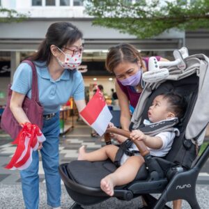 Nicole Seah Instagram - The Workers’ Party East Coast GRC team, including @fooseckguan.sg  and @abdulshariff.sg , was out and about on this sunny National Day at the various markets and locations in EC - 58, 85, 216, 16, Bedok Interchange and Simei. East Coast GRC residents were cheered by patriotic and celebratory vibes as flags were distributed to stallholders, children and the elderly. We wish all Singaporeans and Singapore residents a very happy National Day, and the most-exchanged goodwill greeting of the day - May you be happy and healthy always!