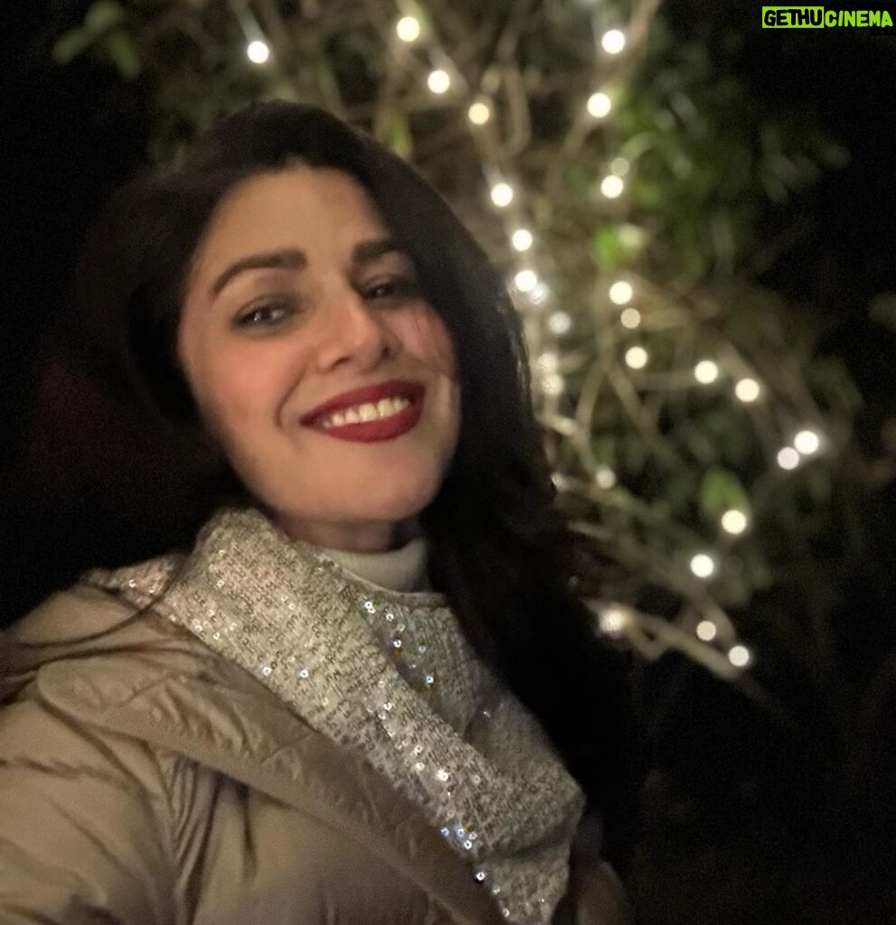 Nimrat Kaur Instagram - Put on a red lip, combed my safari hair, blinged up with a sparkly scarf!! Wishing you all a very very veryyyyy happy new year from me and mine to you and yours!!! Smiles, pouts, the greatest adventures and the best of love and luck this coming New Year 🥂♥️🍀 #happynewyear #happy2024 #loveandlight Deep Jungle