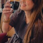 Nisha Rawal Instagram - ♥️ It’s International Coffee Day and here are some-fun-coffee-facts for all coffee enthusiasts: ☕️Coffee was originally chewed, not brewed. ☕️Coffee is a fruit! It’s made from the seeds of coffee cherries. ☕️Coffee is the second most traded commodity globally, after oil. ☕️The word “espresso” comes from an Italian word meaning “pressed out.” ☕️The world’s most expensive coffee is made from beans excreted by civet cats. ☕️Brazil is the world’s largest coffee producer. ☕️The first webcam was invented at Cambridge University to monitor a coffee pot. Before you ask me out for a coffee please note, I like a Dark Roast Americano ♥️ @starbucks . . . . . . Flaunting my lovely earrings and supporting a small business @foramour.in Jumpsuit | @tasuvure . . . . #NishaRawalDiaries #StartUpWithNisha #TravelDiaires #InternationalCoffeeDay