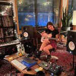 Olivia Rodrigo Instagram - GUTS bts!!!! making this album was so fun and scary and thrilling and fulfilling and im so happy it’s yours!!!!! shout out @dan_nigro couldn’t have done it without you and ur fun tambourine playing!!!!!