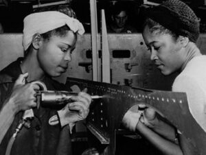 Olivia Swann Instagram - Tonight’s episode of Legends is a special one for me. The story of the Black Rosies, the phenomenal Black women and women of colour who fought to help out on the home front during WWII and endured relentless racism and sexism while they worked, is a story that is rarely told. Despite the intense discrimination, the Black Rosies pushed through because they were proud of the work they were doing and proud of their part in the war effect. Strong Black women have always existed throughout history, I’m here because of them, and honouring their lives and remembering them is such an important part of what we do. It’s an honour to help tell stories like these. 

I was so thrilled to work with @totallykimleigh who is one of the kindest and brightest souls I have ever met. She brought so much sincerity and heart to Gladys and it was humbling to share such beautiful and emotional scenes with her. Kimleigh, I can’t thank you enough.

This episode highlights the strength of women and I couldn’t be more grateful for the incredible women I work with. My gals @lissethchavez @missamypembs @caitylotz @jesmacallan and @talaashe - thank you for having my back. 

Filming this episode was a very personal experience in many ways and, sadly, problematic behaviour and ignorance still exist which is why I care so much about stories like this one.

For the Black Rosies 
Still, we rise
💪🏽🌹