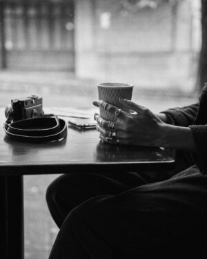 Olivia Swann Instagram - Friday on film ☕️ ⁣
⁣
Had a stroll through Downtown Vancouver with the glorious @noahasanias - a stunning photographer and utter dream of a human 🖤⁣
⁣
#downtown #vancouver #photoshoot #film #coffeemorning #pyrrha #blackandwhite #naturalhair #autumn #chillvibes