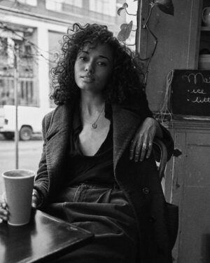 Olivia Swann Instagram - Friday on film ☕️ ⁣
⁣
Had a stroll through Downtown Vancouver with the glorious @noahasanias - a stunning photographer and utter dream of a human 🖤⁣
⁣
#downtown #vancouver #photoshoot #film #coffeemorning #pyrrha #blackandwhite #naturalhair #autumn #chillvibes