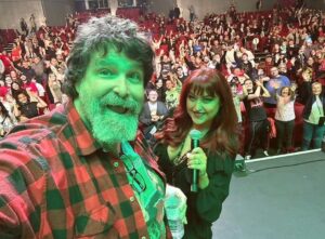 Paige Nicole Mayo Instagram - Repost from WWE HOF-er, the most kind hearted, selfless, most precious soul in #wrestling and Mrs. Foley’s baby boy: @realmickfoley ❤️ Thank YOU, Mick!!!! What an honor to host your panel and get the giggles with you and all the lovely Liverpool fans. ❤️ @comicconlpool @monopolyevents
