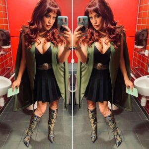 Paige Nicole Mayo Instagram - Ok so listen…a bathroom #selfie is only acceptable if your outfit is THIS fabulous. 😆 👢 I’ve been waiting for colder temperatures so I would wear these beautiful brocade #boots. Tudor-esque tapestry vibes, right? 👑 Chose the music purposely here. My favorite TV show of all time! 
.
.
…one last thing ☝🏼 YES I match my notecards to my outfit at #ComicCons. Duh. 
.
.
Cape: @escalierstore 
Boots: @riverisland 
Belt: Vintage 
.
.
#mirrorselfie #wiw #whatiwore #ootd #boots #kneehighboots