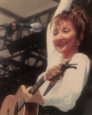Pam Tillis Instagram - I got your Big Bang theory right here! 
I was just starting to tour. 
I think this pic is ‘91 or early ‘92 and I was so happy to get my first big hit and be on the road you might as well have shot me out of a cannon! #90s #90scountry #womenofcountry