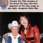 Pam Tillis Instagram - 23 years ago today, I joined the @opry, with Little Jimmy Dickens extending the invitation and @martystuart doing the induction. I’ve made memories I’ll cherish long after I’ve passed the torch to someone else and stepped away from the life of a performer. Until that time, whenever I’m on the road I extend a personal invitation to the audience if they haven’t been. How many times have l stood in the circle thinking (in the words of our precious, legendary family friend Minnie Pearl) and thought “I’m just so proud to be here!” These past 23 years as part of the Opry family have been truly amazing! Grand Ole Opry