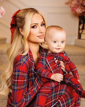 Paris Hilton Instagram - Merry Christmas from the Hilton-Reums! 🎁🎄 At the beginning of 2023, I could never have imagined the happiness and gratitude I would feel in this moment ❤️ My beautiful family of four, my fairytale dream come true! ✨🥹
