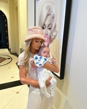 Paris Hilton Instagram - One year ago, a beautiful angel baby entered our lives, bringing so much love and happiness🥹🩵👶🏼✨ My precious little one, you are more than a dream come true. You make my life complete🥰 Every day with you is a priceless gift, and I’m endlessly grateful to be your mommy. 🌟🥰 Celebrating your first of many birthdays, Baby P – here’s to a lifetime of laughter, love, and wonderful adventures with our cutesie crew! 🎉✨ Happy 1st Birthday! 🎂🥳