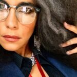 Parisa Fitz-Henley Instagram - Why choose one? Trent Crimm: The Independent Woman Jackie Collins. Happy Halloween, yall! 🎃😈🤓 Image Description: 1. Me with big gray-streaked frizzy hair, Trent Crimm glasses, Jackie Collins makeup, gray jacket and black button-down either of them could wear, silver dangling earrings, red lanyard that reads “Independent”, a notebook and pen. 2. Trent Crimm (of The Independen and Ted Lasso fame) in glasses, blazer, button down and tie. His face framed by luscious gray hair. 3. Jackie Collins, novelist extraordinaire, big frizzy delicious 80’s hair, loads of dramatic 80’s makeup, leopard print blazer/choker/earrings, staring down the camera like she’s about to pounce. 4. Me continuing to feel myself but this time with a bit of a pearl and diamond(ish) choker peeking out at my neckline)
