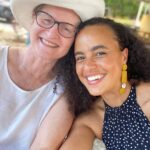 Parisa Fitz-Henley Instagram - So many thanks for all the wonderful birthday greetings over the last few days! I’m so grateful I got to spend my birthday doing things I love — alone, with IG friends via Live, and with my family. Feeling so blessed. I’m doing my best to read each greeting and respond where I can but if I don’t get to respond directly to you please know I’m feeling grateful and full of the love you’ve shared with me. As much of a downside social media can have, it also offers this magical experience of connection with so many souls. And this week it’s brought me happiness through you. I wish you allll the deepest happiness in return. In gratitude, Parisa Image description: A close up pic of me leaning into my mom. I’m wearing a black halter dress with white polka dots and mustard-colored earrings. My mom is wearing a white top, white sun hat, and glasses. We are smiling.