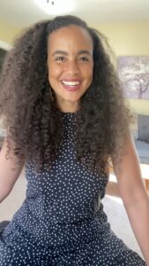 Parisa Fitz-Henley Instagram - Hoping to channel some birthweek joy into the wonderful work of @themonafoundation! Have a look at the link in my bio for info and please consider joining me as I raise US$1,111 to invest in a month of school for 101 students through Mona’s worldwide partners! 💓 Thanks for spreading the love! Video description: I’m sitting, facing camera. I have brown skin, eyes and hair and am wearing a black and white polka dot dress.