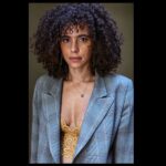 Parisa Fitz-Henley Instagram – Tbt to shooting with my long-time friend @raziwilsonphotography. She’s just moved back to LA so folks looking to shoot for work, play or healing (Razi uses therapeutic approaches for those looking to incorporate photography into their own healing work) check her out.

Image description: A professional photo of me, from the waist up. I’m looking into camera. My hair is curly and I’m wearing a yellow lace top under a gray patterned blazer, with a small gold and pyrite necklace.