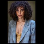 Parisa Fitz-Henley Instagram - Tbt to shooting with my long-time friend @raziwilsonphotography. She’s just moved back to LA so folks looking to shoot for work, play or healing (Razi uses therapeutic approaches for those looking to incorporate photography into their own healing work) check her out. Image description: A professional photo of me, from the waist up. I’m looking into camera. My hair is curly and I’m wearing a yellow lace top under a gray patterned blazer, with a small gold and pyrite necklace.