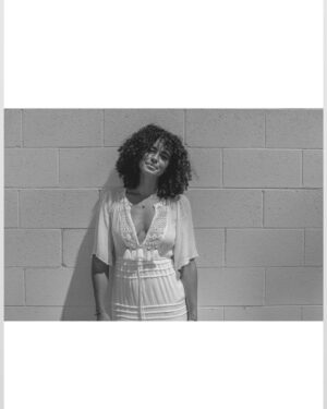 Parisa Fitz-Henley Instagram - More LA memories. Exploring shadow and light with @raziwilsonphotography 🤍🖤🩶

Post description: Three slides - black and white photos of me. A close up of me looking to camera, a medium shot of me walking, and a medium shot of me leaning back on a wall. In all I wear the same white dress and my hair is curly and shoulder length.

*Reposting correct edits
