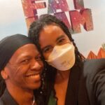 Parisa Fitz-Henley Instagram - #FatHam on Broadway with one of my besties. 🎭 🥰 This is the last week so if you’re in NY grab tix! Front and center of the mezzanine is fantastic! Slide 1: Me smiling, my hair in twists, wearing a white N95 respirator, gold earrings and a black blazer. I’m standing in front of the words “Fat Ham” in glitter on a wall. Slide 2: Me smiling, same place and time but with my friend Aeric (also smiling), who has brown skin and is wearing a silver necklace and thick black hair wrap/band. Slide 3: A selfie of me in my seat in the theater
