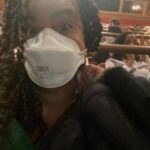 Parisa Fitz-Henley Instagram - #FatHam on Broadway with one of my besties. 🎭 🥰 This is the last week so if you’re in NY grab tix! Front and center of the mezzanine is fantastic! Slide 1: Me smiling, my hair in twists, wearing a white N95 respirator, gold earrings and a black blazer. I’m standing in front of the words “Fat Ham” in glitter on a wall. Slide 2: Me smiling, same place and time but with my friend Aeric (also smiling), who has brown skin and is wearing a silver necklace and thick black hair wrap/band. Slide 3: A selfie of me in my seat in the theater