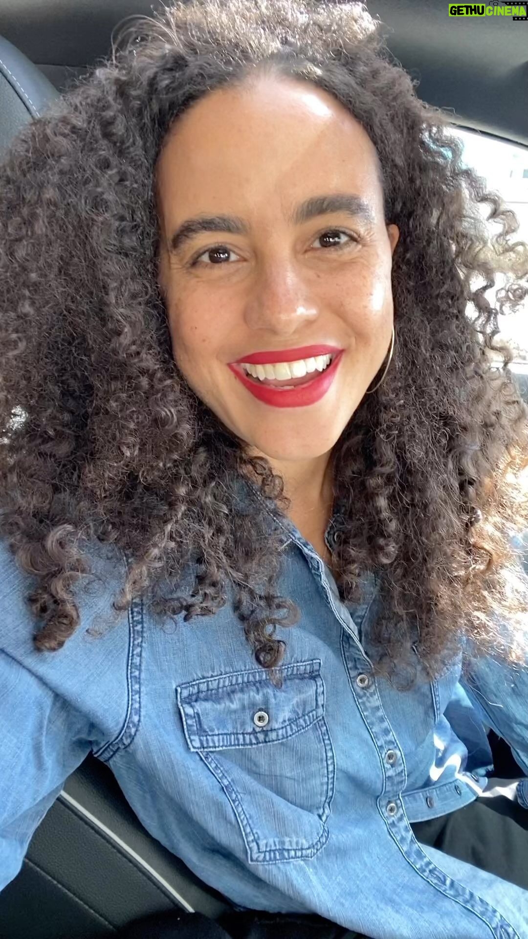 Parisa Fitz-Henley - 526 Likes - Great news!!! @themonafoundation exceeded our #GivingTuesday goal by over 50%!! 18 young women will now be able to complete their education at the Barli Institute in Indore, India — improving the lives of an estimated 1,800 people along with them over time!! I’m so happy to see this and to know that so many people worked together to improve lives through so many organizations yesterday. Definitely something to remember when things get tough, that good things are happening too. I know I need that reminder daily. 🙏♥️🥹 Many many thanks to all who contributed financially or with good wishes and prayers for the success of this endeavor. Love to all!
Video description: Close shot of me, brown skin, darker brown curly hair and dark brown eyes, red lipstick and medium gold hoop earrings. I’m wearing a blue denim button down shirt and sitting in my car. It’s daytime and cars are passing by on the road beside me.