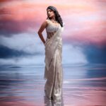 Pavithra Lakshmi Instagram - In the heart of a distant galaxy, where stars weave tales of timeless elegance, Pachaiyappas World introduces the Prismatic Luminescence Christmas Edition. Amidst celestial realms, three regal queens—Aryastra, Celestara, and Eclipsara—embrace the cosmic festivities, each personifying a unique facet of the collection. Aryastra graces the cosmic stage in 'Festive Frost Crystal,' embodying the serene beauty of winter nights. Her saree, woven with threads of starlight, captures the iridescence of snow-kissed crystals, echoing the silent magic of Christmas. . Model : @pavithralakshmioffl Creative concept design & Styling: @gowtham.618 Jewel: @aaranyarentaljewellery @idayaluxeee . #PachaiyappasMagic #pachaiyappas #pachaiyappassilks #silk #silksofindia #traditionalwear #festive #fantasy #christmas #collection #concept #shooting #creativephotography #creative #art #instagood #festivecollection #divine #textile #clothing #designer #fashion #stylewithpachaiyappas #saree #creativefashion #designerwear #sareelove #silver #trending