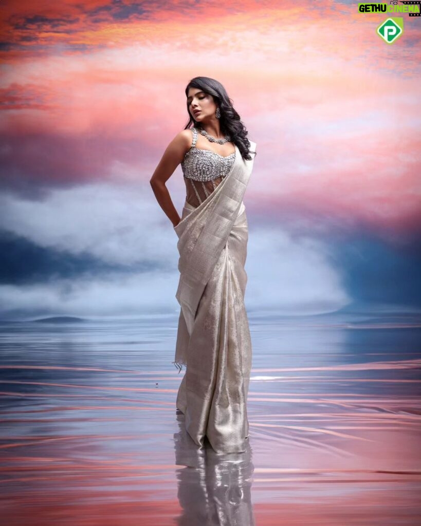 Pavithra Lakshmi Instagram - In the heart of a distant galaxy, where stars weave tales of timeless elegance, Pachaiyappas World introduces the Prismatic Luminescence Christmas Edition. Amidst celestial realms, three regal queens—Aryastra, Celestara, and Eclipsara—embrace the cosmic festivities, each personifying a unique facet of the collection. Aryastra graces the cosmic stage in 'Festive Frost Crystal,' embodying the serene beauty of winter nights. Her saree, woven with threads of starlight, captures the iridescence of snow-kissed crystals, echoing the silent magic of Christmas. . Model : @pavithralakshmioffl Creative concept design & Styling: @gowtham.618 Jewel: @aaranyarentaljewellery @idayaluxeee . #PachaiyappasMagic #pachaiyappas #pachaiyappassilks #silk #silksofindia #traditionalwear #festive #fantasy #christmas #collection #concept #shooting #creativephotography #creative #art #instagood #festivecollection #divine #textile #clothing #designer #fashion #stylewithpachaiyappas #saree #creativefashion #designerwear #sareelove #silver #trending
