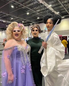 Pixie Polite Instagram - DragCon day 1 with my sisters @tiakofi @woeaddams 🎉 and celebrating Tia’s big announcement! 💜 💚 ❤️ see you all Sunday at Booth C78 🍄🍃🧚‍♀️ • #Drag #DragCon #RuPaul’sDragCon #RuPaul’sDragRace #RuPaul’sDragRaceUK #DragQueens #DragQueens #Tiakofi #TheVixens #vstheworld #ukvstheworld #versustheworld #ukversustheworld #rupaul #draguk #instadrag #dragrace #dragraceuk #rpdr #rpdruk ExCeL London