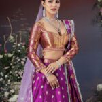 Preety Kongana Instagram - The soft whisper of the vibrant violet speaks of mysteries and romance… Violet 💜 in love with this beautiful bridal lehenga 💜💜 @bidyut_rakesh Bridal couture 2023/2024 💜💜 Makeover - @kalyani_barman9 Jewellery - @goldenwindow Photography - @rakesh_chetia_studio Fresh Flower Decoration - @arazfloraguwahati Production - @brahmaputra_diaries Creative Director - @rakesh_chetia_studio