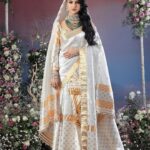 Preety Kongana Instagram - In every thread of a traditional bridal outfit there’s a story, a legacy, and a dream waiting to unfold….♥️♥️♥️ Koina — Bridal Couture 2023/2024 Bidyut&Rakesh — Modern Luxury Heritage Assam Silk 🙏🏻 Collection Is Inspired By The Modern Art And Vibrancy Of Indian Culture. Essence of Mulberry Silk Embellished With Premium Zaree Works With Golden , Silver , Signature Beads,Crystals And Pearls … Such a beautiful bridal Assamese main set by @bidyut_rakesh ♥️ you never fail me to amaze with your amazing creativity ♥️ More power to you my dear ♥️♥️ Pairing with absolutely beautiful pieces of jewelleries by @sabitajainboutiquejewelry ♥️ Flawless makeup 💄 by @kalyani_barman9 ♥️ U gorgeous 😘 u r a stunner always ♥️ With magical hands ♥️ Beautifully captured n designed by my dear brother @rakesh_chetia_studio ♥️love you bro ♥️God bless you ♥️ N last but not the least @arazfloradecorator ♥️such beautiful ornamentations with flowers ♥️ Thank you all ♥️🙏🏻
