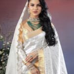 Preety Kongana Instagram - In every thread of a traditional bridal outfit there’s a story, a legacy, and a dream waiting to unfold….♥️♥️♥️ Koina — Bridal Couture 2023/2024 Bidyut&Rakesh — Modern Luxury Heritage Assam Silk 🙏🏻 Collection Is Inspired By The Modern Art And Vibrancy Of Indian Culture. Essence of Mulberry Silk Embellished With Premium Zaree Works With Golden , Silver , Signature Beads,Crystals And Pearls … Such a beautiful bridal Assamese main set by @bidyut_rakesh ♥️ you never fail me to amaze with your amazing creativity ♥️ More power to you my dear ♥️♥️ Pairing with absolutely beautiful pieces of jewelleries by @sabitajainboutiquejewelry ♥️ Flawless makeup 💄 by @kalyani_barman9 ♥️ U gorgeous 😘 u r a stunner always ♥️ With magical hands ♥️ Beautifully captured n designed by my dear brother @rakesh_chetia_studio ♥️love you bro ♥️God bless you ♥️ N last but not the least @arazfloradecorator ♥️such beautiful ornamentations with flowers ♥️ Thank you all ♥️🙏🏻