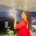 Priyanka Nalkari Instagram – #mybalcony #starlights #christmasdecor #favsymbol #star #cutegirlinreddress #evening #view #malaysia #kl #insta #instagood #instadaily #instafashion #instagram