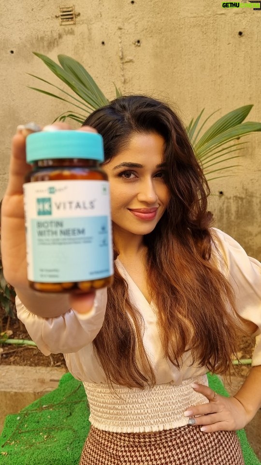 Purneima Day Instagram - Say goodbye to dandruff and hello to healthy hair growth with HK Vitals Biotin with Neem. This powerful supplement combines the natural benefits of biotin, essential for healthy hair, skin, and nails, with the anti-dandruff properties of neem. Neem is a powerful herb that has been used for centuries in Ayurvedic medicine to treat a variety of ailments, including dandruff. Its active compounds azadirachtin and nimbidin work together to combat dandruff and microbes, while Bhringraj and neem hydrate the scalp, promoting healthy hair growth. With HK Vitals Biotin with Neem, you get a complete solution to promote healthy hair growth and a dandruff-free scalp. Visit www.hkvitals.com today and nourish your hair from the inside out! You can also use my code PURNEIMA to get an additional 10% off!