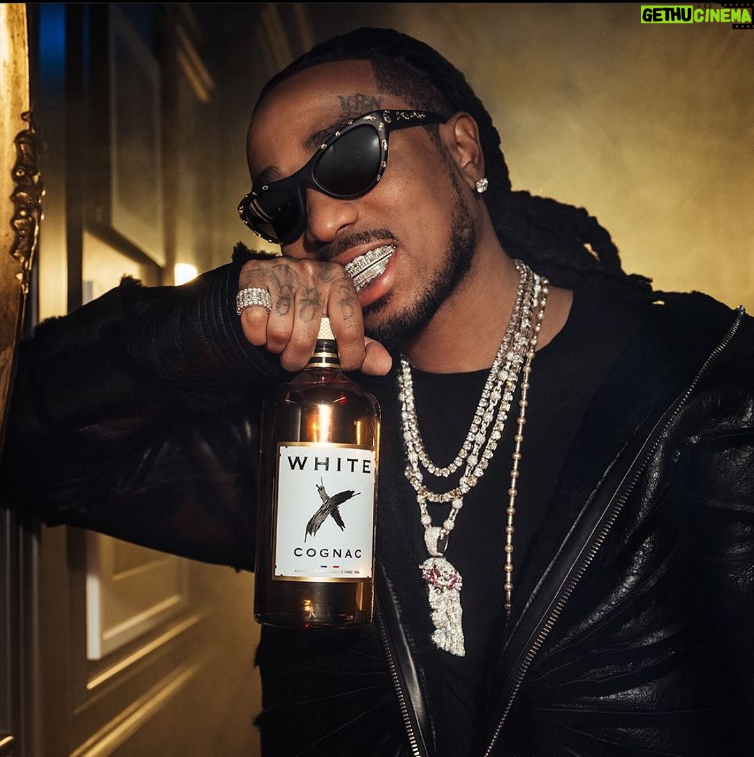 Quavo Instagram - Taking cognac to a new level with White X Pop bottles like a Huncho and always remember ❎ Marks the Spot! #WhiteXcognac #Whitexcognacpartner #ad21+