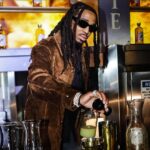 Quavo Instagram - Taking cognac to a new level with White X Pop bottles like a Huncho and always remember ❎ Marks the Spot! #WhiteXcognac #Whitexcognacpartner #ad21+