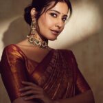 Raashi Khanna Instagram - In a world of trends, my heart belongs to sarees ♥️ #timeless Makeup @makeupbyshefali.s Hair @zoequiny.hair Jewelery @tritiyaa.jewellery 📸 @ishan.n.giri
