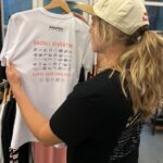 Rachel Atherton Instagram - My T- Shirt re-stock 🥰🥺😝You guys seemed to Love them at Fort William which was so rad ❤️ 40 wins Band Style // or 40 crowns Adult & kids ❤️ we’ve finally ordered more sizes & you can find them on the @athertonbikes website under “Gear” Link in bio ✌️ @dora_rgb helped design these and I love them ❤️ Felt weird to make a T shirt blowing my own trumpet but then I just thought, YOLO 😂 Thanks so much Dora, for creating the crown 👑 vibe so perfectly ❤️👑❤️🌈 If you order now they should be with you before CRIMBO / Christmas ❤️ Carve your own path.