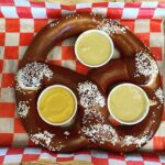 Rachel Nichols Instagram – Travel days are always cheat days. This pretzel is as big as my head…