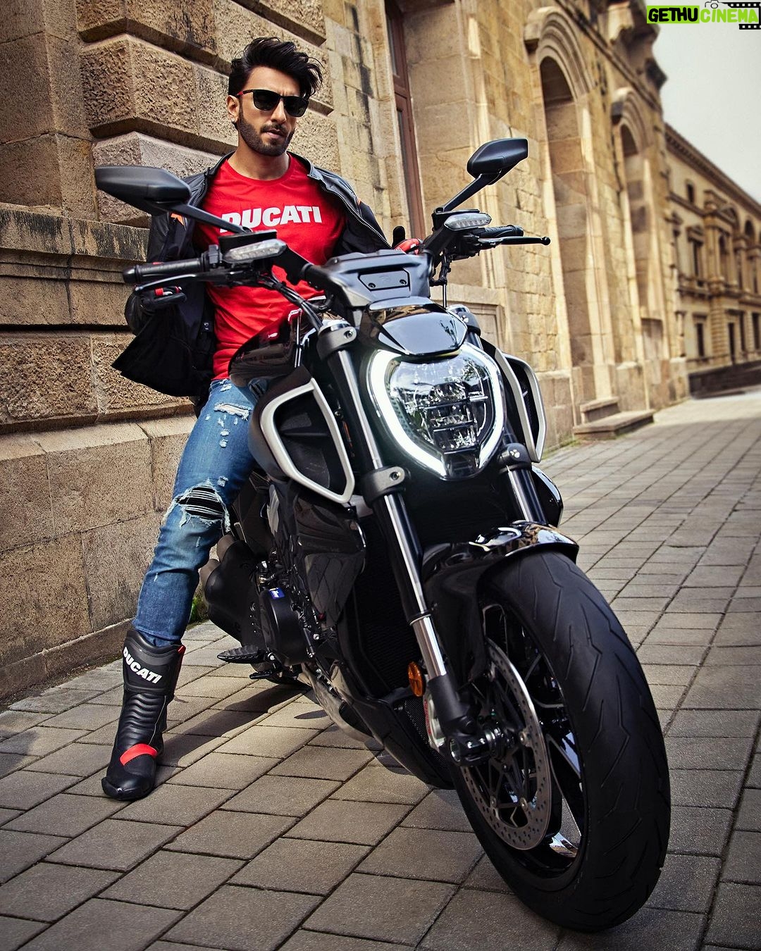 Ranveer Singh Instagram - Dare to be bold. Here's welcoming @ranveersingh to the world of @ducati at the launch of the Diavel V4! We are thrilled to announce him as our Ambassador and congratulate him as the first Diavel V4 of India heads to his garage! #DucatiXRanveer #DareToBeBold #DiavelV4