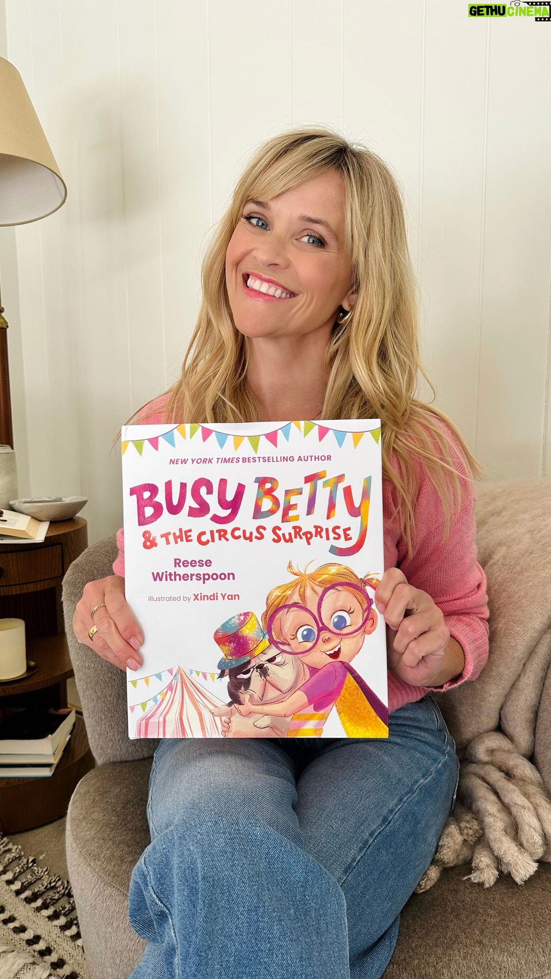 Reese Witherspoon Instagram - Busy Betty is BACK!! My second children’s book Busy Betty and the Circus Surprise comes out next month on Oct. 3!!! Based off my personality as a kid, Busy Betty is spirited, larger-than-life and always has LOTS of ideas 🤸♀️💖💫 Join Betty (and her adorable dog Frank! 🐶) in this new book as she comes up with the ah-mazing idea to throw her mom a circus birthday party and plans what will obviously be the greatest day in the history of the universe!! But not everything goes exactly as planned… 😉😬🤣 Pre-order your copy now at the link in bio! 🎶: Bobby Day