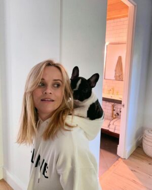 Reese Witherspoon Instagram - #NationalLoveYourPetDay, aka just a normal day in my life... thankful for my furry friends 🥰🐾